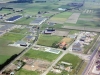 linksboven de loodsen aan de Nucleonweg